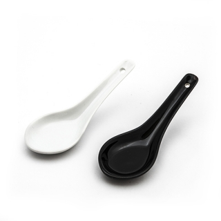 White or black porcelain spoon
